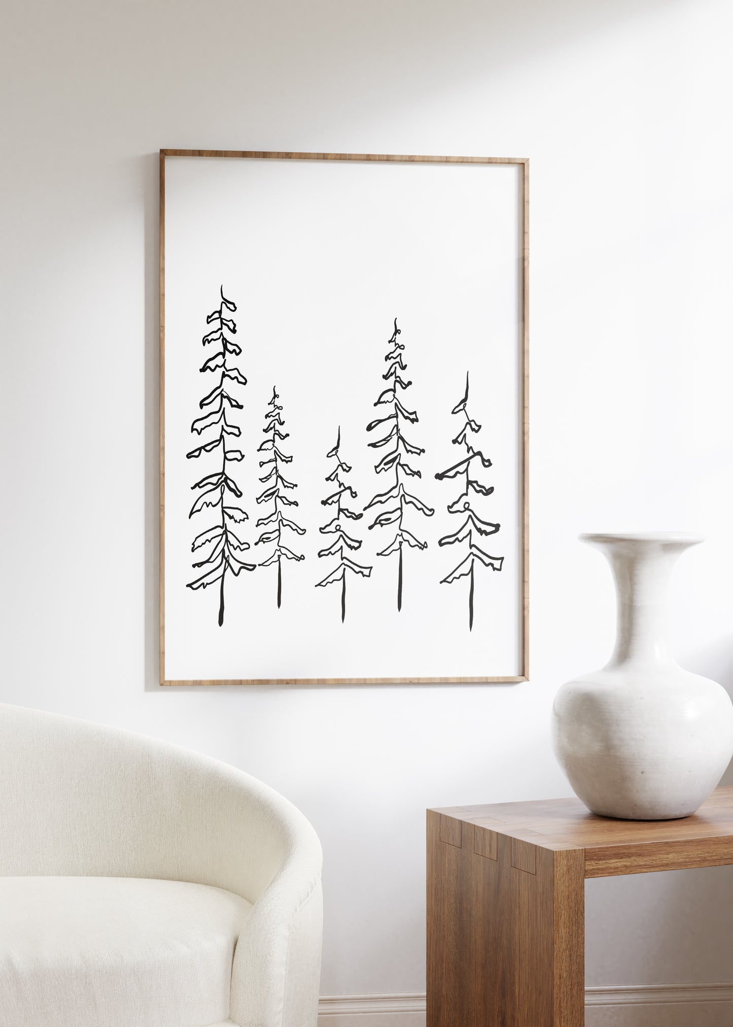 one line tree drawing framed in a wood frame in living room decor